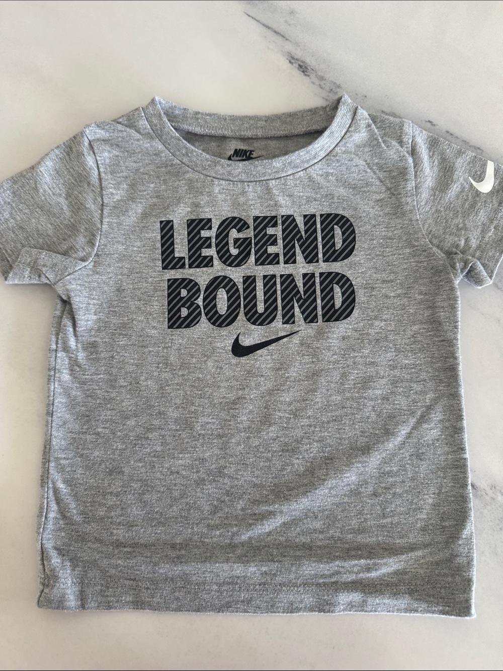 Nike Grey Kids Tee with Navy 'Legend Bound' Graphic